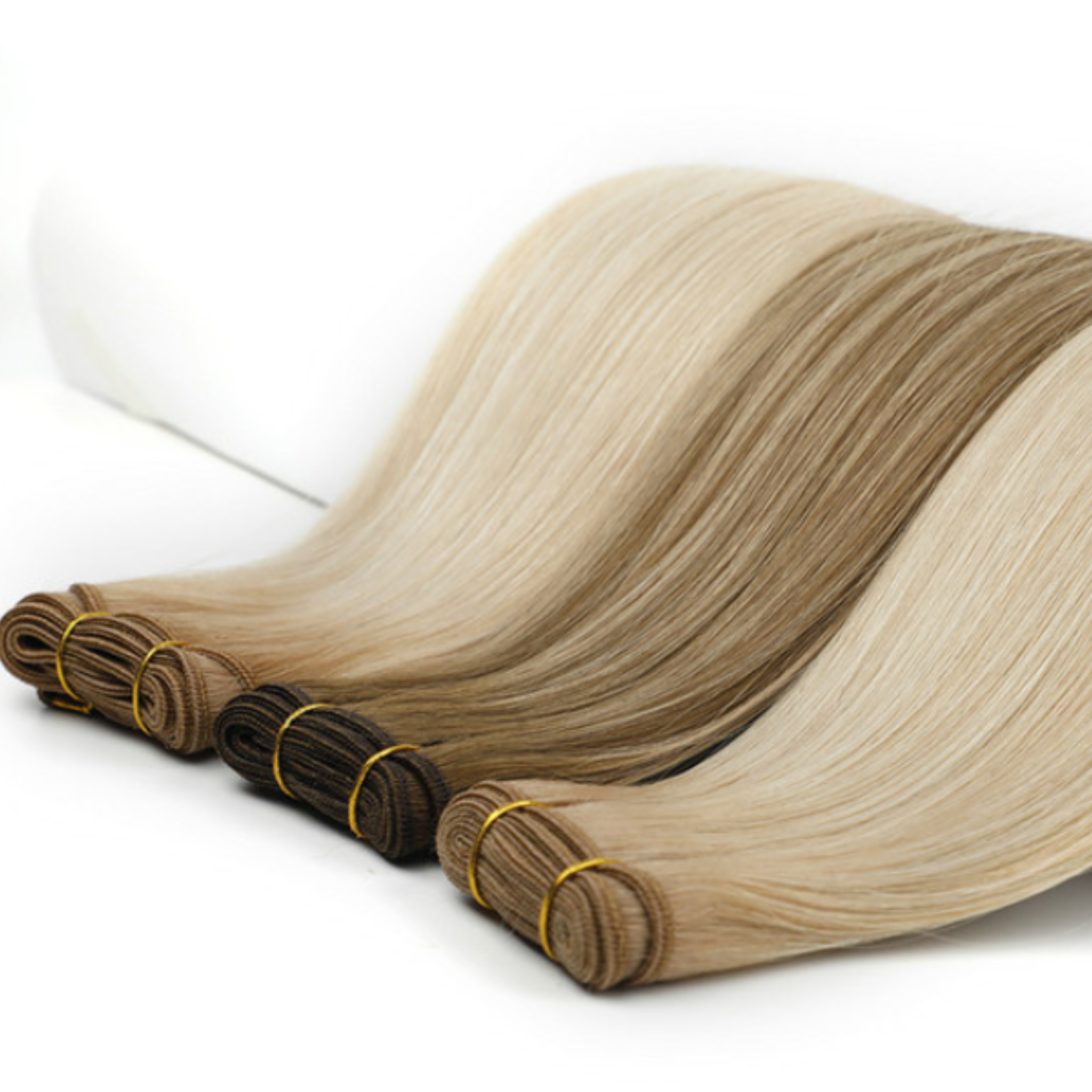 smooth 3 different shades of weft hair extensions in brown, blonde and light brown shade